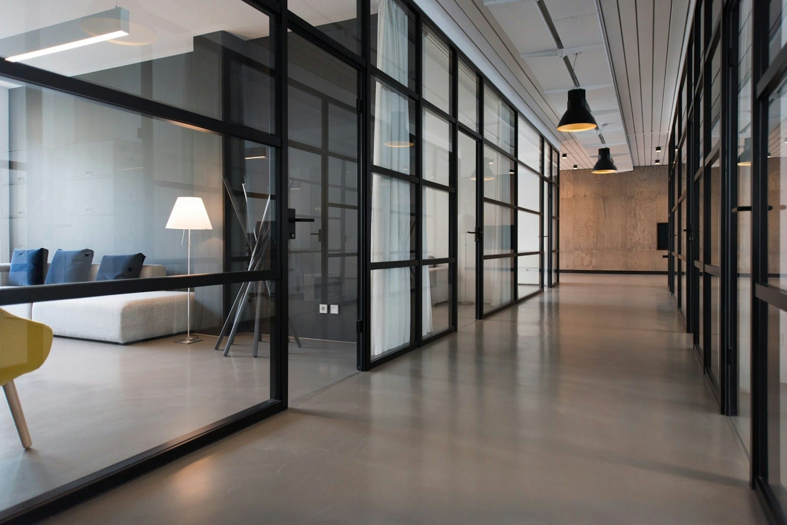 An empty office hallway after a difficult workplace process