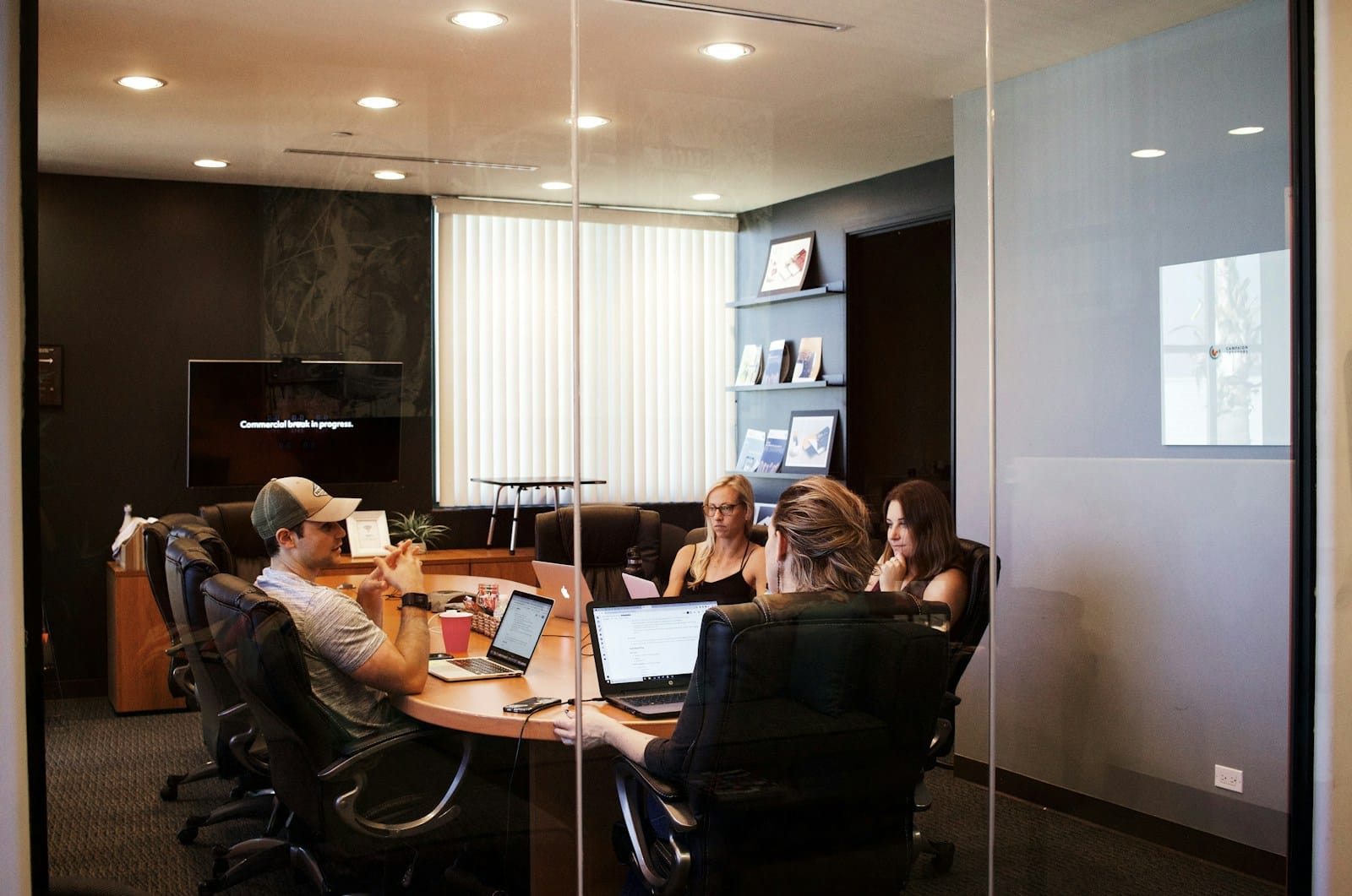 Leaders discussing transition planning in a meeting